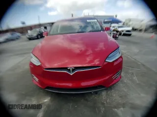 2016 Tesla Model X 70D with VIN 5YJXCAE28GF002399, listed as a Copart auction lot 50884225 with 73,113 mi miles and Salvage Title. Bid and sale history available at DreamBid. Image 11.