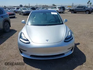 2018 Tesla Model 3 Long Range Battery with VIN 5YJ3E1EB5JF100578, listed as a IAAI auction lot 41959766 with 57,931 mi miles and . Bid and sale history available at DreamBid. Image 12.