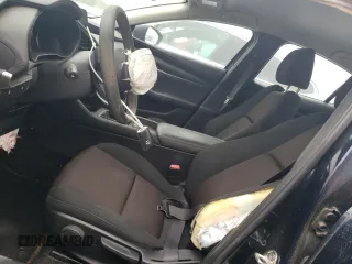 2021 Mazda 3 S with VIN JM1BPAAL3M1326099, listed as a Copart auction lot 52400115 with 58,159 mi miles and Salvage Title. Bid and sale history available at DreamBid. Image 7.
