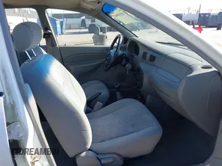 1999 Ford Escort LX with VIN 1FAFP10P7XW216711, listed as a IAAI auction lot 41851068 with 70,499 mi miles. Bid and sale history available at carsss.com. Image 5.