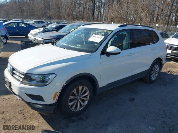 2018 Volkswagen Tiguan S with VIN 3VV1B7AX1JM015870, listed as a IAAI auction lot 41632032 with 82,578 mi miles. Bid and sale history available at carsss.com. Image 2.