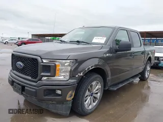 2018 Ford F-150 XL z VIN 1FTEW1CP3JKC21438, wystawiony jako IAAI lot #42207035 z przebiegiem 86 417 mil mil oraz . Historia ofert i sprzedaży dostępna na DreamBid. Obrazek 19.