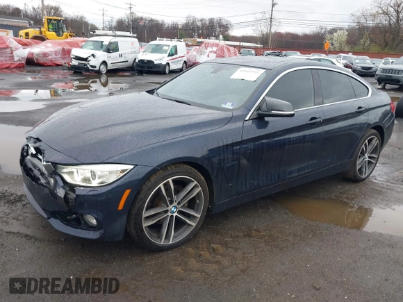 2016 BMW 4 Series 428i xDrive with VIN WBA4C9C59GG137067, listed as a IAAI auction lot 41913733 with 104,378 mi miles and . Bid and sale history available at carsss.com. Image 18.