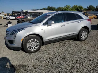 2017 Cadillac XT5 FWD with VIN 1GYKNARS5HZ129017, listed as a Copart auction lot 64133225 with 160,890 mi miles and Salvage title. Bid and sale history available at DreamBid. Image 1.