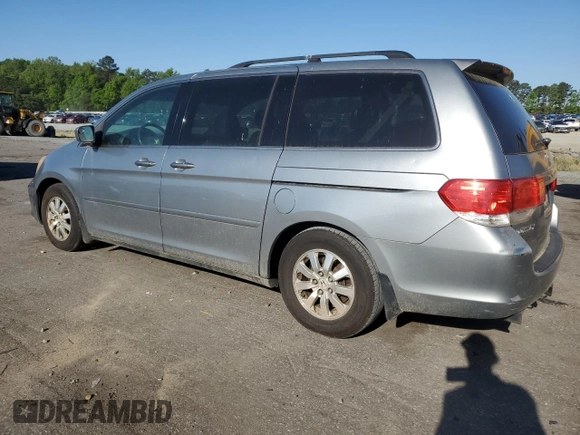 2010 Honda Odyssey EX-L with VIN 5FNRL3H67AB001948, listed as a Copart auction lot 54886465 with 289,596 mi miles and Clean Title. Bid and sale history available at carsss.com. Image 2.