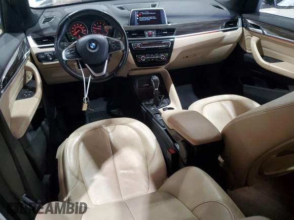 2017 BMW X1 xDrive28i with VIN WBXHT3Z34H4A54811, listed as a Copart auction lot 63584405 with 92,699 mi miles and Salvage title. Bid and sale history available at DreamBid. Image 8.