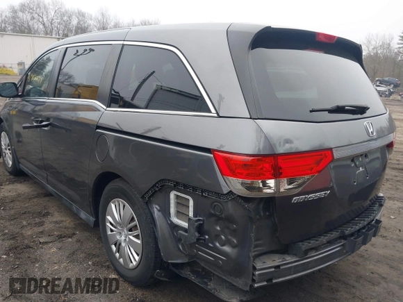 2014 Honda Odyssey LX z VIN 5FNRL5H2XEB009962, wystawiony jako IAAI lot #41902277 z przebiegiem 152 661 mil mil oraz . Historia ofert i sprzedaży dostępna na DreamBid. Obrazek 3.