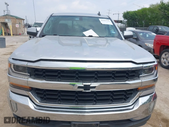 2018 Chevrolet Silverado 1500 LT with VIN 3GCPCREC8JG645232, listed as a IAAI auction lot 41927715 with 95,601 mi miles and . Bid and sale history available at DreamBid. Image 6.