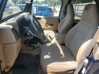 2002 Jeep Wrangler X with VIN 1J4FA39S32P735671, listed as a Copart auction lot 68236084 with 137,587 mi miles and Salvage Title. Bid and sale history available at carsss.com. Image 7.