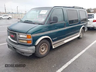 1997 GMC Savana with VIN 1GDFG15R6V1004277, listed as a IAAI auction lot 41462401 with 495,223 mi miles. Bid and sale history available at carsss.com. Image 2.