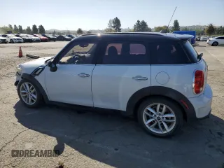 2014 MINI Countryman S with VIN WMWZC3C5XEWP25792, listed as a Copart auction lot 58583455 with 83,831 mi miles and Salvage title. Bid and sale history available at DreamBid. Image 2.