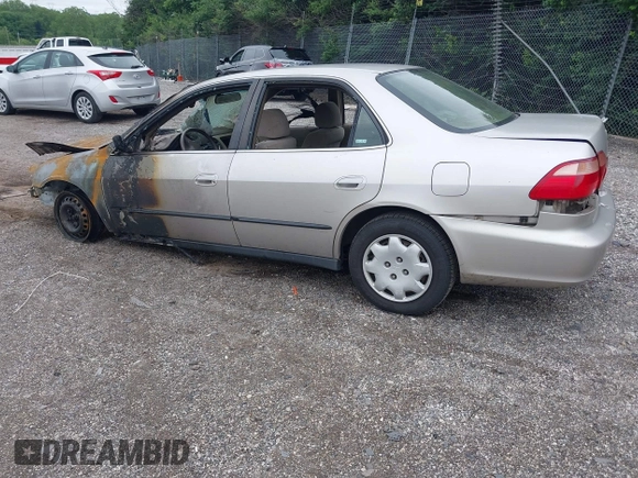 1999 Honda Accord LX with VIN 1HGCG6659XA113823, listed as a IAAI auction lot 42462228 with Not provided miles and . Bid and sale history available at DreamBid. Image 3.