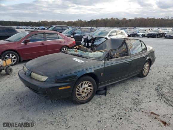 1999 Saturn SL with VIN 1G8ZJ5276XZ106206, listed as a Copart auction lot 75212184 with 0 mi miles and Salvage Title. Bid and sale history available at carsss.com. Image 1.