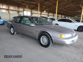 1995 Mercury Cougar z VIN 1MELM62W2SH613956, wystawiony jako Copart lot #49742425 z przebiegiem 94 806 mil mil oraz Tytuł czysty. Historia ofert i sprzedaży dostępna na DreamBid. Obrazek 4.