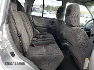2004 Chevrolet Tracker LT z VIN 2CNBE634346901609, wystawiony jako Copart lot #86977504 z przebiegiem 59 089 mil mil oraz Szkoda całkowita • Salvage title. Historia ofert i sprzedaży dostępna na DreamBid. Obrazek 11.
