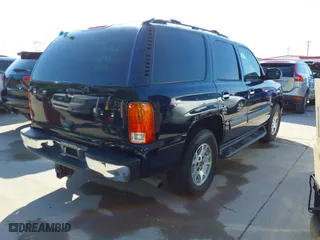 2004 Chevrolet Tahoe LT with VIN 1GNEC13Z64R186097, listed as a IAAI auction lot 42035901 with 285,408 mi miles. Bid and sale history available at carsss.com. Image 4.