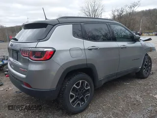 2020 Jeep Compass Trailhawk with VIN 3C4NJDDB9LT127231, listed as a IAAI auction lot 41817392 with 111,344 mi miles and . Bid and sale history available at carsss.com. Image 4.