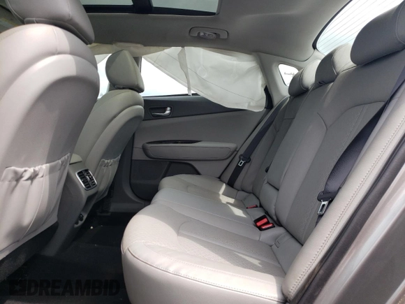 2016 Kia Optima EX z VIN 5XXGU4L3XGG071893, wystawiony jako Copart lot #62540165 z przebiegiem 12 781 mil mil oraz Szkoda całkowita • Salvage title. Historia ofert i sprzedaży dostępna na DreamBid. Obrazek 10.