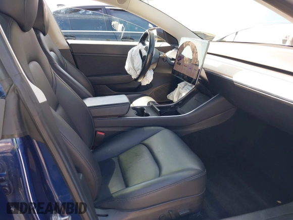 2018 Tesla Model 3 Long Range Battery with VIN 5YJ3E1EA1JF014630, listed as a IAAI auction lot 41877296 with 137,294 mi miles and . Bid and sale history available at DreamBid. Image 5.