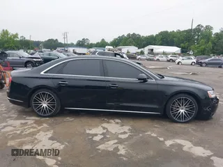 2015 Audi A8 4.0T с VIN WAU32AFD8FN019377, выставлен на аукционе IAAI как лот 42501787 с пробегом 116 355 миль миль и . История ставок и продаж доступна на DreamBid. Изображение 14.