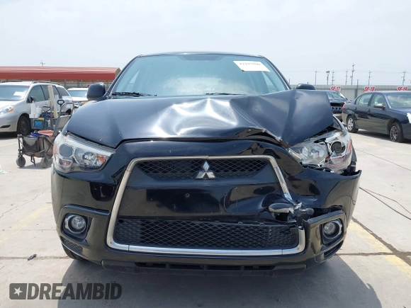 2012 Mitsubishi Outlander SE with VIN JA4AP4AU1CZ002844, listed as a IAAI auction lot 42297590 with 66,065 mi miles and . Bid and sale history available at DreamBid. Image 12.