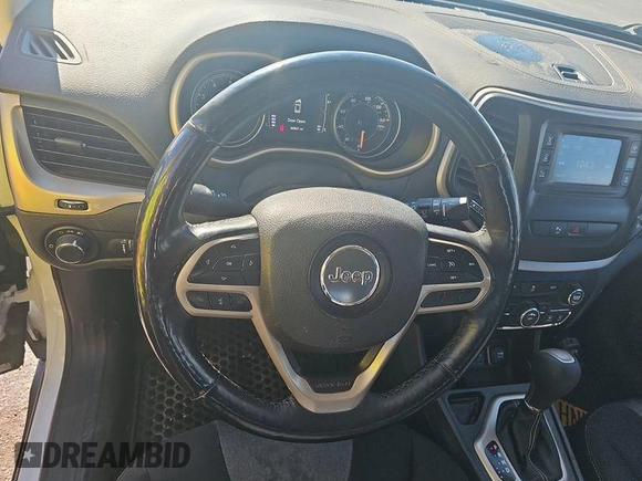 2017 Jeep Cherokee Sport with VIN 1C4PJLABXHW660505, listed as a IAAI auction lot 42680671 with 98,907 mi miles and . Bid and sale history available at DreamBid. Image 26.