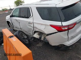 2018 Chevrolet Traverse High Country with VIN 1GNEVKKW4JJ133786, listed as a IAAI auction lot 42076685 with 167,787 mi miles and . Bid and sale history available at DreamBid. Image 3.