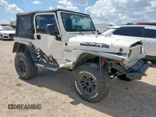 2004 Jeep Wrangler Sport z VIN 1J4FA49SX4P802341, wystawiony jako Copart lot #62752565 z przebiegiem 150 197 mil mil oraz Szkoda całkowita • Salvage title. Historia ofert i sprzedaży dostępna na DreamBid. Obrazek 4.