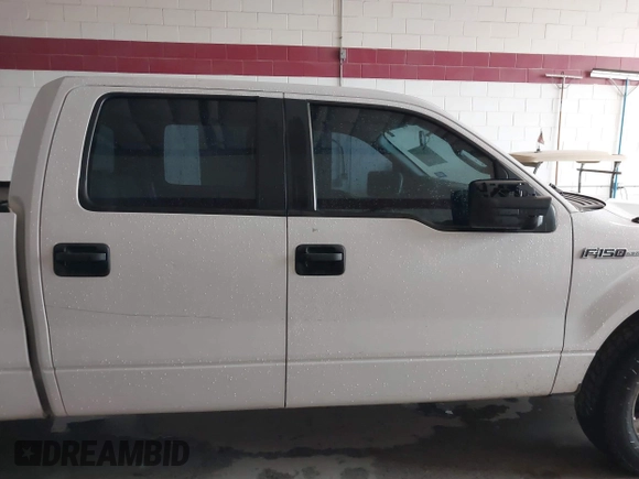 2014 Ford F-150 XL with VIN 1FTFW1EF5EKE45762, listed as a IAAI auction lot 41762773 with 203,423 mi miles. Bid and sale history available at carsss.com. Image 13.
