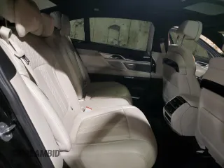2017 BMW 7 Series with VIN WBA7F2C34HG423291, listed as a Copart auction lot 42914665 with 61,113 mi miles and Salvage Title. Bid and sale history available at DreamBid. Image 10.