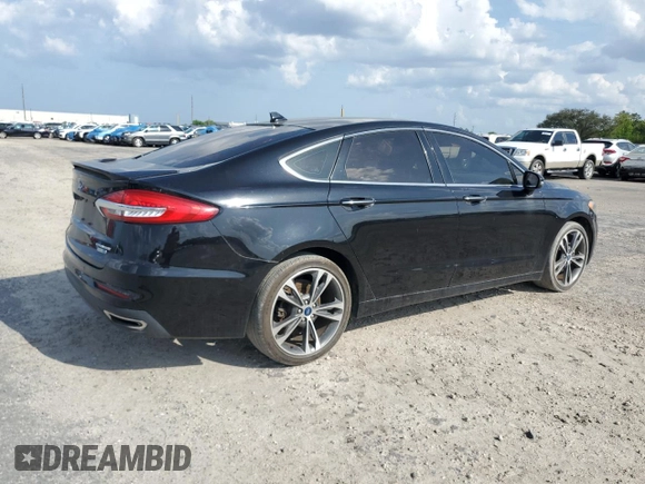 2019 Ford Fusion Titanium with VIN 3FA6P0D97KR184134, listed as a Copart auction lot 50913245 with 128,888 mi miles and Clean Title. Bid and sale history available at carsss.com. Image 3.