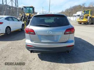 2015 Mazda CX-9 Sport with VIN JM3TB2BA6F0455539, listed as a IAAI auction lot 41839466 with 143,667 mi miles and . Bid and sale history available at carsss.com. Image 17.