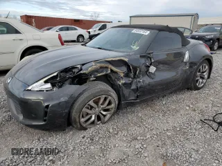 2014 Nissan 370Z Touring with VIN JN1AZ4FHXEM621358, listed as a Copart auction lot 84832164 with 65,441 mi miles and Salvage Title. Bid and sale history available at DreamBid. Image 1.