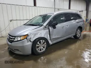 2016 Honda Odyssey SE with VIN 5FNRL5H31GB109718, listed as a Copart auction lot 54689915 with 48,933 mi miles and Salvage Title. Bid and sale history available at DreamBid. Image 1.