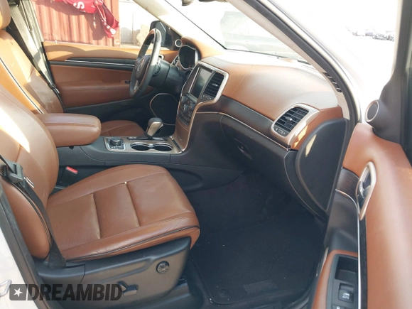 2016 Jeep Grand Cherokee Summit with VIN 1C4RJFJG3GC318626, listed as a IAAI auction lot 40737019 with 92,880 mi miles and . Bid and sale history available at DreamBid. Image 5.