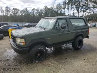 1992 Ford Bronco XL with VIN 1FMEU15N2NLA71562, listed as a Copart auction lot 48827285 with 198,042 mi miles and Salvage Title. Bid and sale history available at carsss.com. Image 1.