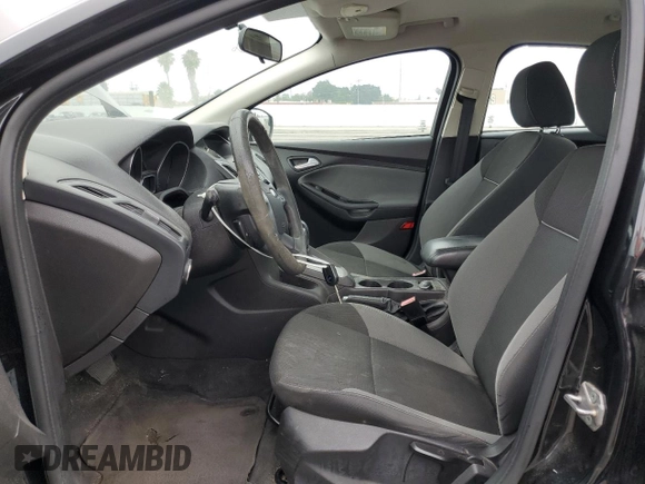 2013 Ford Focus SE z VIN 1FADP3F20DL335132, wystawiony jako Copart lot #61042315 z przebiegiem 149 443 mil mil oraz Czysty tytuł • Clean title. Historia ofert i sprzedaży dostępna na DreamBid. Obrazek 7.