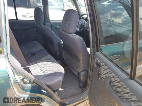 1998 Toyota RAV4 with VIN JT3HP10V5W7089021, listed as a IAAI auction lot 42739970 with 198,329 mi miles and . Bid and sale history available at DreamBid. Image 8.