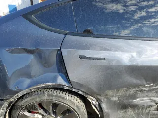 2022 Tesla Model Y Performance with VIN 7SAYGDEF0NF452111, listed as a Copart auction lot 47595975 with 33,514 mi miles and Salvage Title. Bid and sale history available at DreamBid. Image 11.