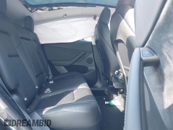 2025 Tesla Model Y Long Range with VIN 7SAYGDED4SF226776, listed as a IAAI auction lot 41514317 with 1,636 mi miles and . Bid and sale history available at DreamBid. Image 8.