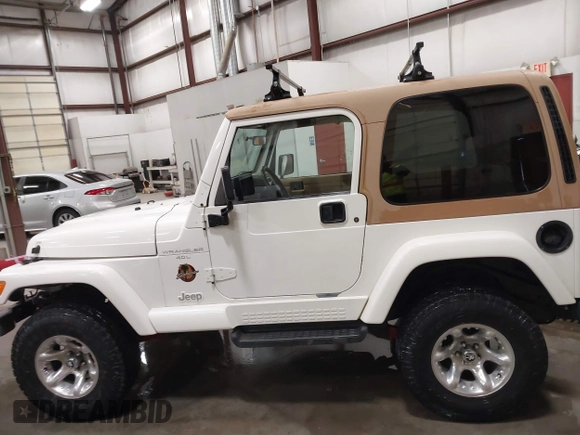 1997 Jeep Wrangler Sahara with VIN 1J4FY49S3VP529837, listed as a IAAI auction lot 41752978 with 138,024 mi miles. Bid and sale history available at carsss.com. Image 14.