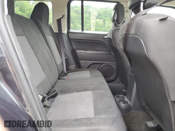 2014 Jeep Patriot Latitude with VIN 1C4NJRFB4ED588422, listed as a Copart auction lot 61401025 with 162,855 mi miles and Salvage title. Bid and sale history available at DreamBid. Image 11.