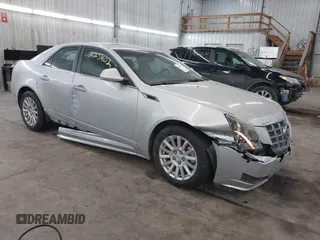 2012 Cadillac CTS with VIN 1G6DC5E53C0143414, listed as a IAAI auction lot 41425402 with 150,472 mi miles and . Bid and sale history available at DreamBid. Image 1.