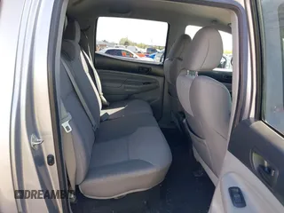 2014 Toyota Tacoma with VIN 3TMLU4EN7EM146705, listed as a IAAI auction lot 41949827 with 147,887 mi miles and . Bid and sale history available at DreamBid. Image 8.