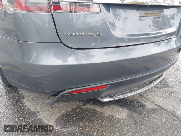 2013 Tesla Model S with VIN 5YJSA1CN8DFP21869, listed as a IAAI auction lot 41772603 with Not provided miles and . Bid and sale history available at DreamBid. Image 6.