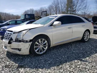2014 Cadillac XTS Luxury z VIN 2G61M5S36E9317116, wystawiony jako Copart lot #51281855 z przebiegiem 106 917 mil mil oraz Tytuł czysty. Historia ofert i sprzedaży dostępna na DreamBid. Obrazek 1.