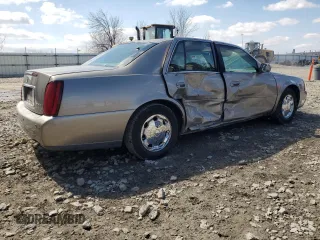 2002 Cadillac DeVille DHS z VIN 1G6KE57Y32U107755, wystawiony jako Copart lot #52811235 z przebiegiem 111 141 mil mil oraz Nie do naprawy. Historia ofert i sprzedaży dostępna na DreamBid. Obrazek 3.