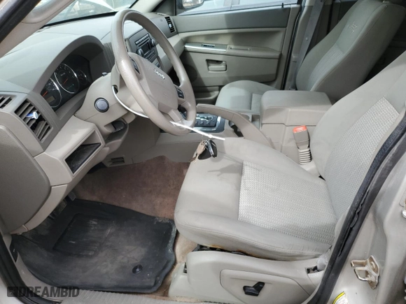 2007 Jeep Grand Cherokee Laredo with VIN 1J8HR48N27C632418, listed as a Copart auction lot 49002915 with 115,855 mi miles and Clean Title. Bid and sale history available at carsss.com. Image 7.