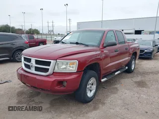 2006 Dodge Dakota SLT with VIN 1D7HE48KX6S598831, listed as a IAAI auction lot 41292884 with 173,181 mi miles and . Bid and sale history available at carsss.com. Image 21.