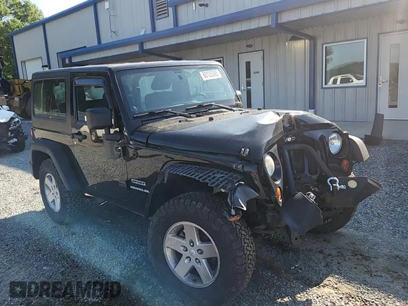 2012 Jeep Wrangler Sport with VIN 1C4AJWAG5CL273292, listed as a Copart auction lot 60135395 with 123,874 mi miles and Salvage title. Bid and sale history available at DreamBid. Image 14.